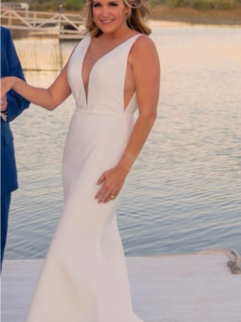 Elegant White V-Neck Sleeveless Women's Wedding Gown by Romona Keveza.